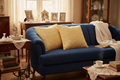 Two Gold Diamond Pillows on 1930s dark blue velvet sofa
